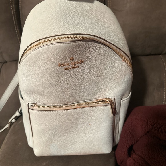 kate spade Handbags - Kate Spade Cream Backpack with Gold Accents